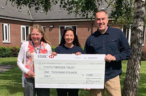 AYMES presents cheque of £1000 to Cystic Fibrosis Trust
