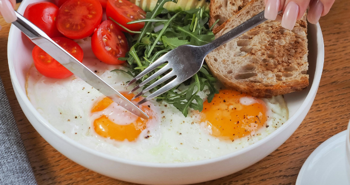 someone eating high protein food
