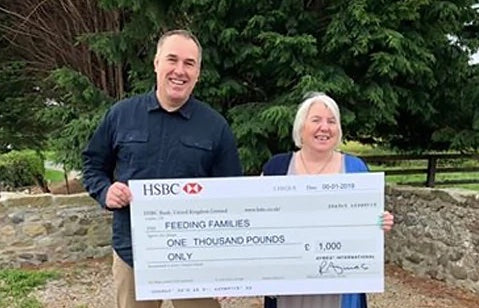 AYMES donates to Feeding Families