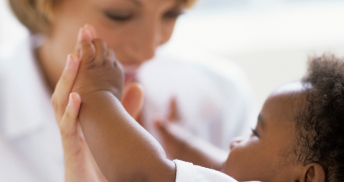 healthcare professional with paediatric patient