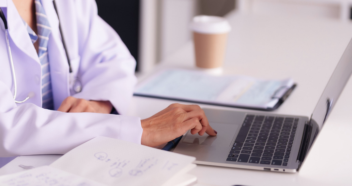 Dietitian at desk with coffee