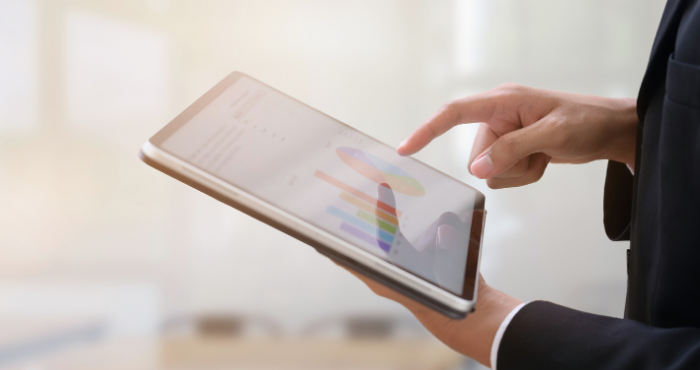 lady looking at data on ipad