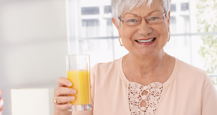 Lady drinking juice-style ONS