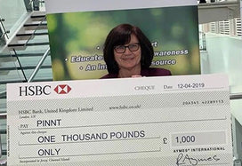 Lady from PINNT receiving cheque from AYMES