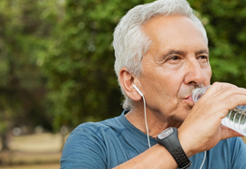 Older man drinking water