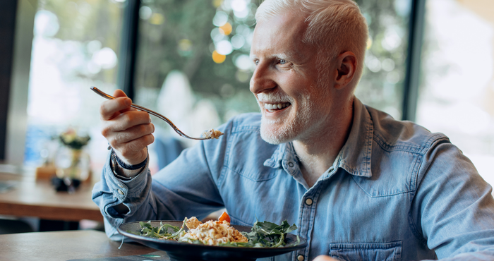 Man eating a healthy plate of food