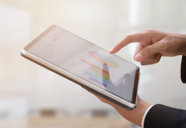 lady looking at data on ipad