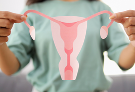 woman holding uterus