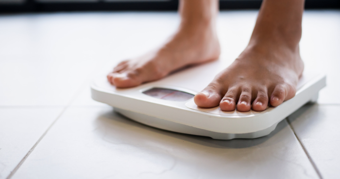 lady standing on scales